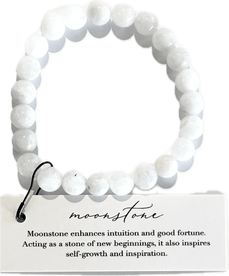 White beaded bracelet on a card with moonstone information