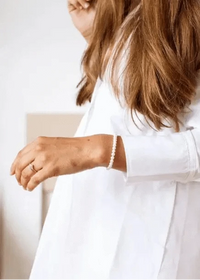 Moonstone bracelet by Shiny Soul Creations, worn with white button-down — available at Lemonberry near Newmarket
