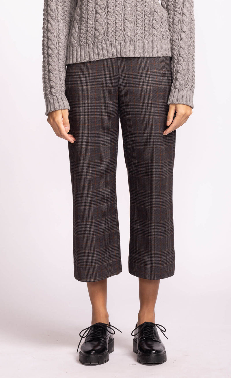 Nadia Pant by Pink Martini in orange plaid pattern, cropped length, styled with sweater
