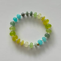 Namaste Jewellery Dania Bracelet Lagoon stretch bracelet with lime green aqua and pearl beads flat lay on white background