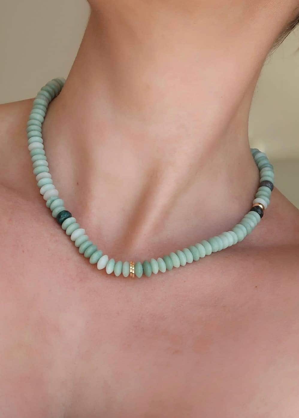 Model wearing Namaste Jewellery Dania Stone Necklace in turquoise with soft green stone beads and gold accents - Lemonberry Aurora