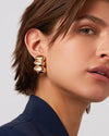 Non-Stop Earrings by Jenny Bird styled with navy blazer — statement gold jewelry worn in Aurora, ON