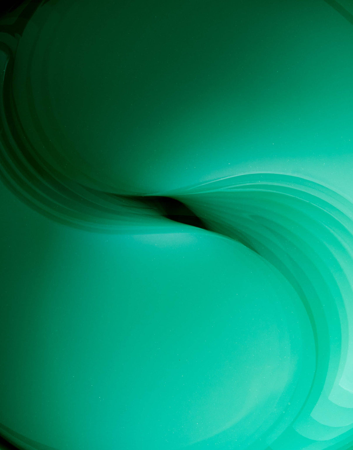 Macro texture of Three Ships Off Duty gel formula in deep green tone
