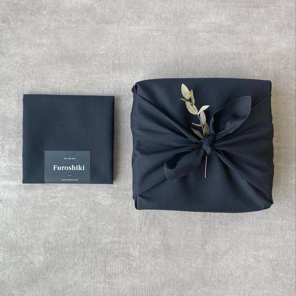 Olsen + Olsen Furoshiki wrap – packaging flat view, plastic-free minimal design from Aurora.