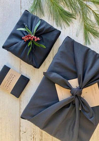 Olsen + Olsen Furoshiki wrap in navy with greenery accent – giftable holiday style near Kleinburg Village.