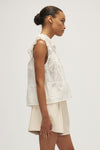 Side view of Paloma Blouse, eyelet blouse with ruffle details by Melissa Nepton at Lemonberry Aurora