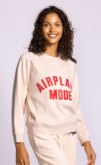 Pink Martini Airplane Mode III sweater pink relaxed lightweight knit with red applique lettering angled view Lemonberry Aurora