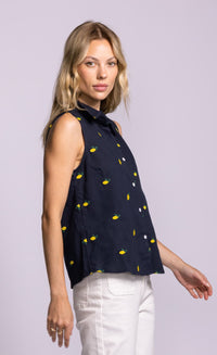 Pink Martini sleeveless lemon top in navy side view, Lemonberry