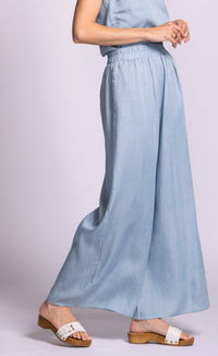 Side view of Pink Martini Dash blue wide-leg pants with flowy lightweight fabric