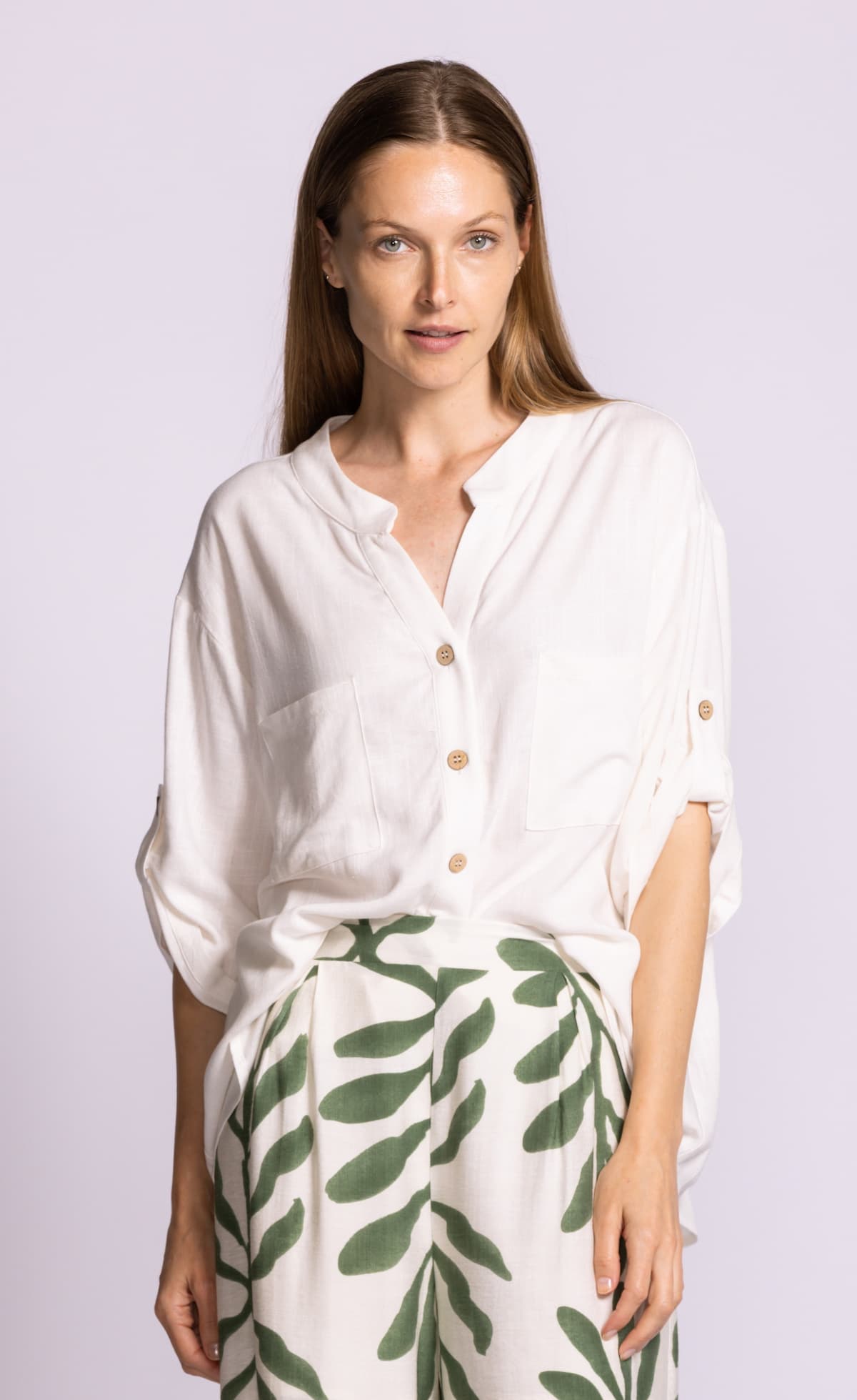 Pink Martini Gigi linen-blend blouse in White, button-front detail