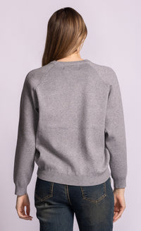 Pink Martini Good Vibes grey sweater, back view showing raglan sleeves