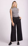 Black Juna Pant by Pink Martini, cropped wide leg, styled with sleeveless mockneck top.