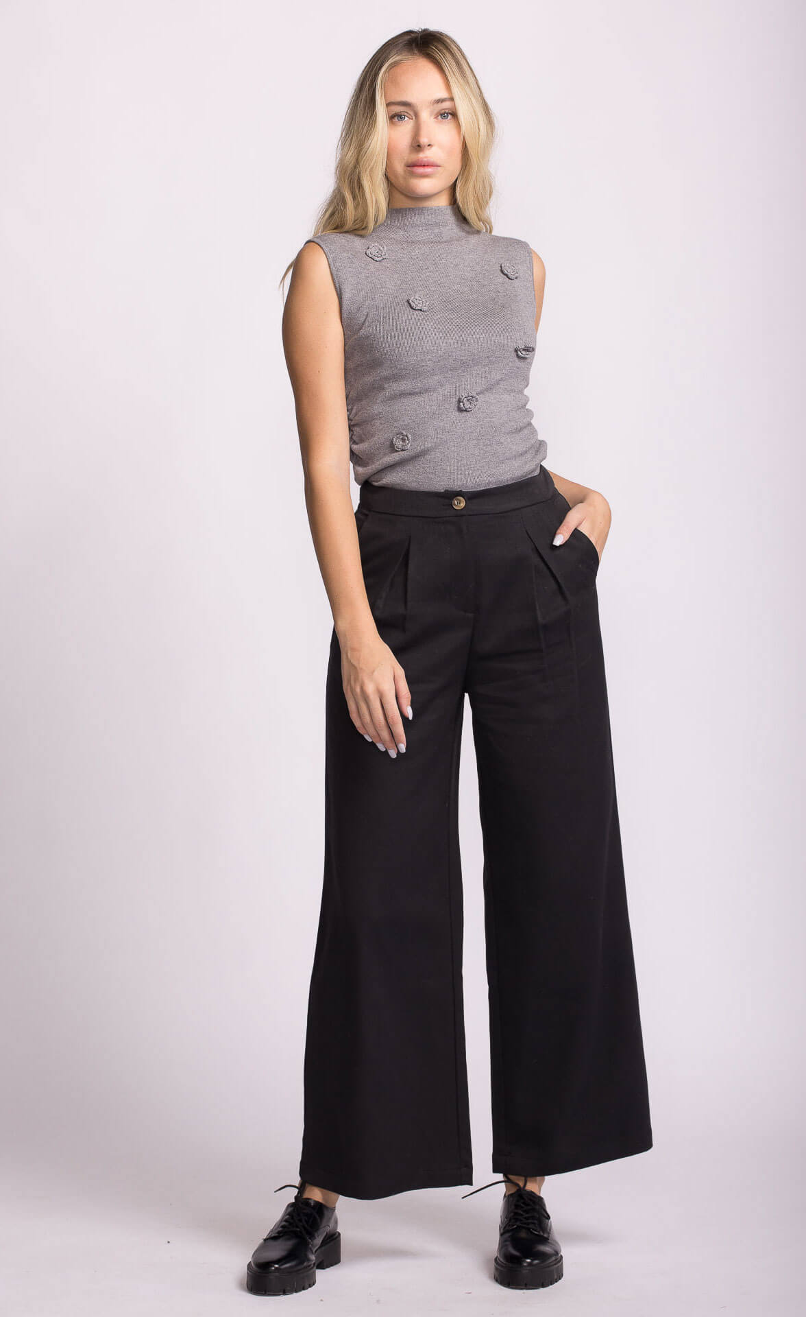 Black Juna Pant by Pink Martini, cropped wide leg, styled with sleeveless mockneck top.