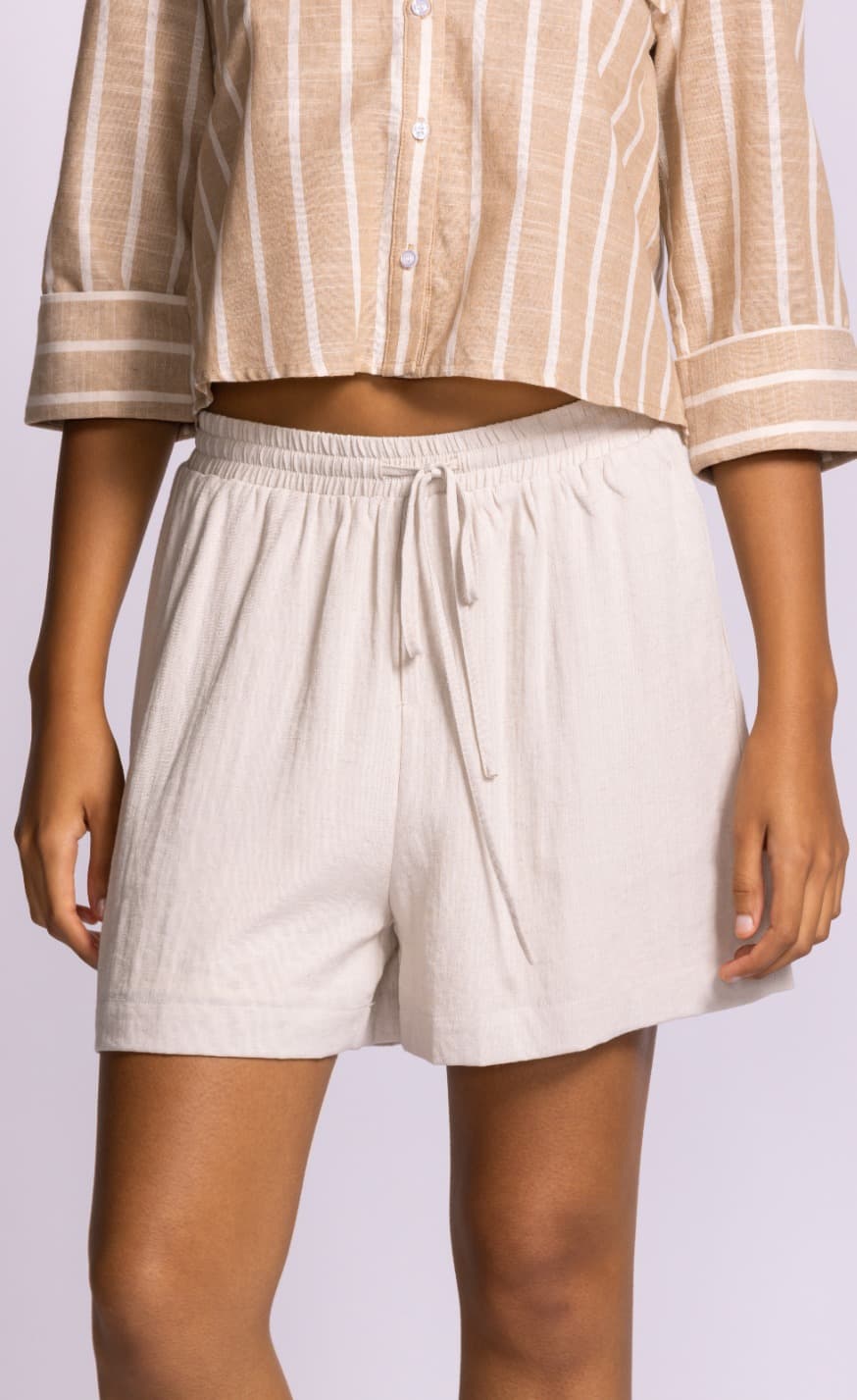 Pink Martini Killion shorts beige linen blend drawstring model front view Lemonberry Aurora