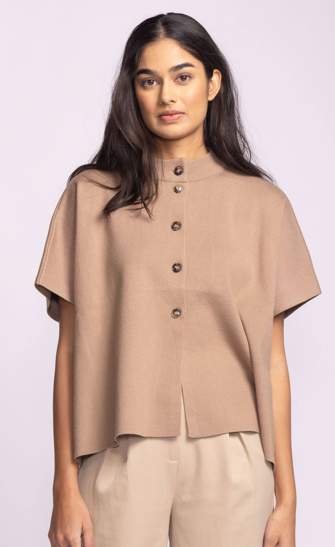 Close-up of Pink Martini Melrose Sweater showing button-up front and soft knit texture in neutral tan.