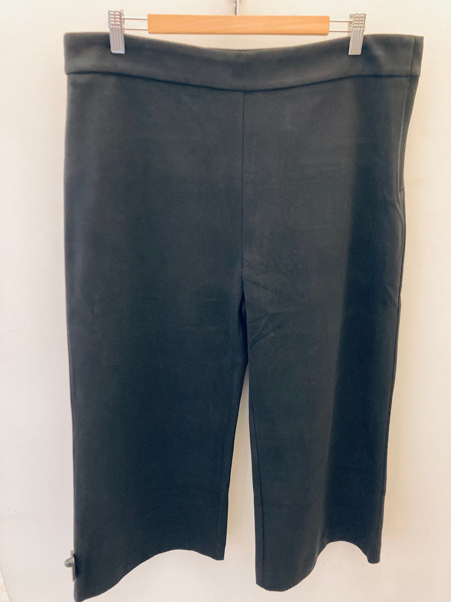 black cropped wide leg trousers hanging on wooden hanger Pink Martini Nadia Pant Lemonberry Aurora display