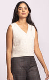 Side angle of the Pink Martini Sevilla ivory sleeveless vest with textured floral knit and button details.