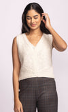 Sevilla Vest by Pink Martini in ivory, styled with plaid trousers, lightweight layering knit.