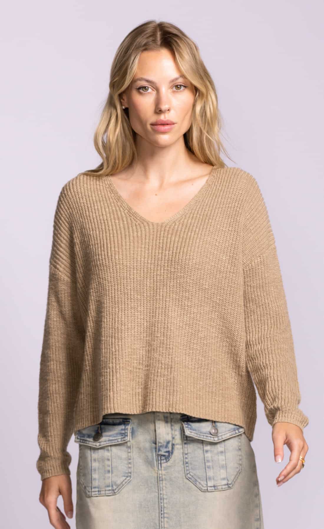 Front view of Pink Martini Sherri sweater in beige featuring relaxed fit and textured rib knit.