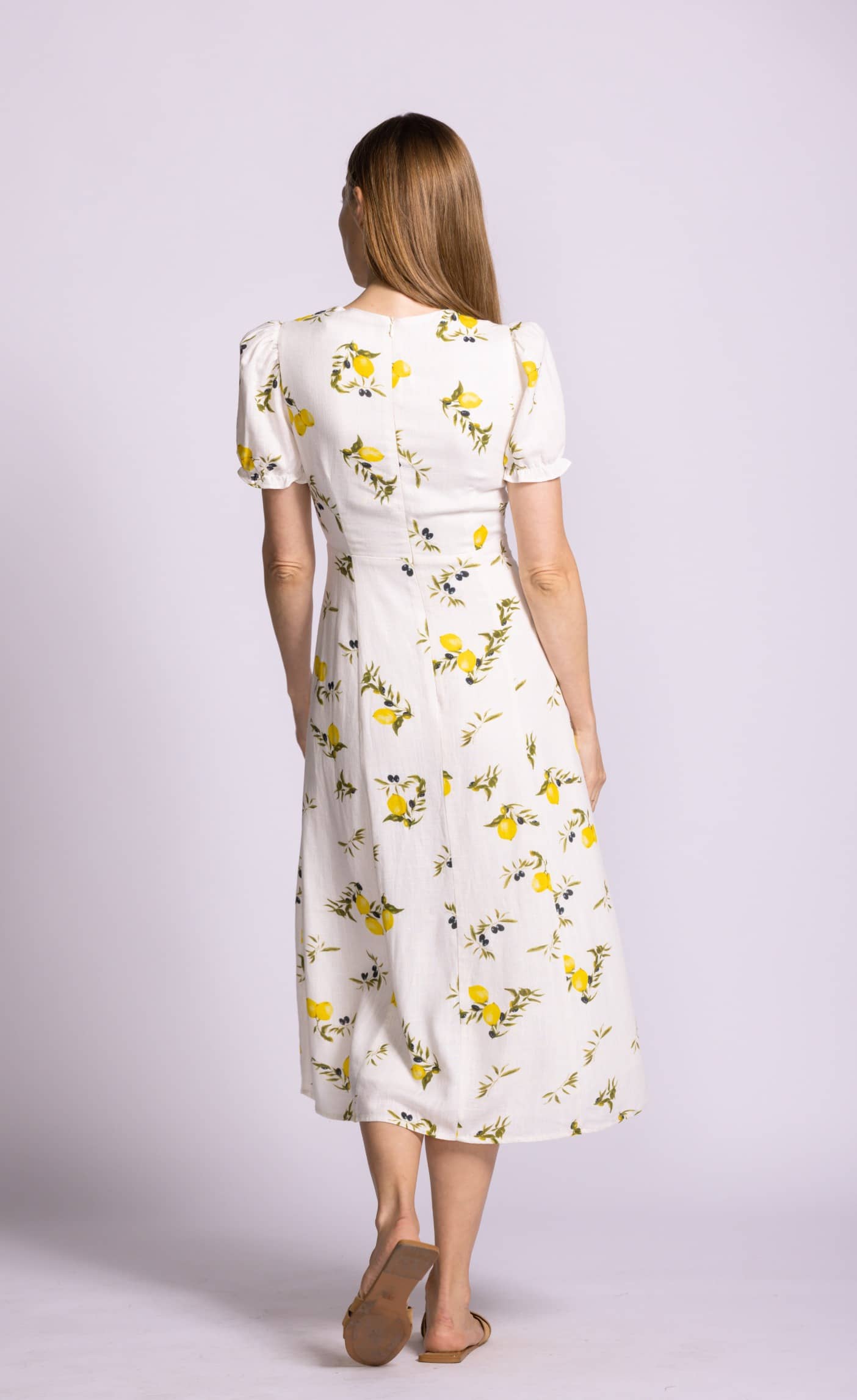 Pink Martini Sorrento dress lemon print midi walking back view Lemonberry Aurora