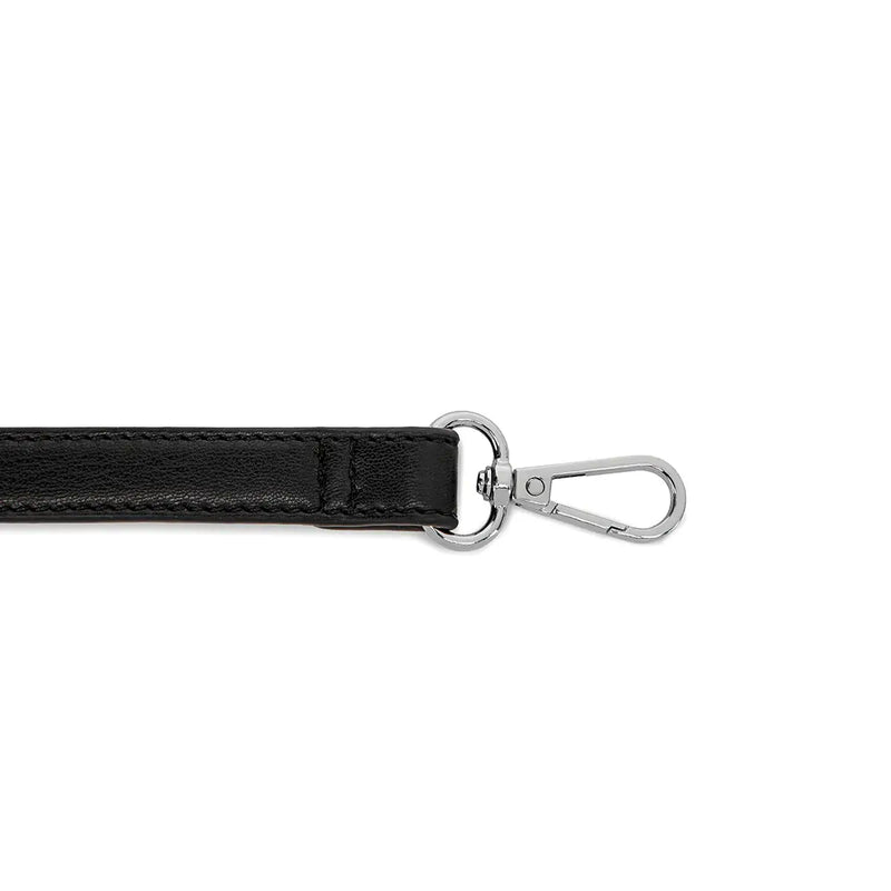 Close-up of silver hardware on Pixie Mood Crescent Bag strap.