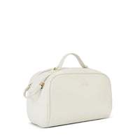 Three-quarter view of Pixie Mood Teagan Toiletry Case in white with gold hardware and double-zip—shop Lemonberry, Aurora ON.