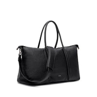 angled view of black vegan leather amara weekender travel bag, lemonberry aurora