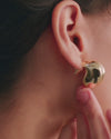 Close up video of Nouveaux Puff Earrings on a model.