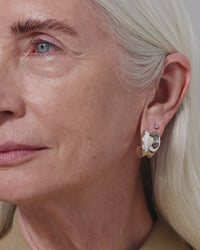 Video of a woman wearing Jenny Bird's Chunky Doune earrings in silver