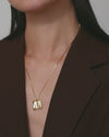 Jenny Bird Sundra Small Pendant Necklace in motion — gold pendant shimmer video, Lemonberry Aurora.