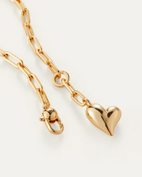 Close-up of Jenny Bird Puffy Heart Necklace gold link chain and clasp — Lemonberry Aurora detail