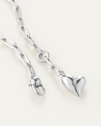 Close-up of Jenny Bird Puffy Heart Necklace silver link chain — Lemonberry Aurora detail