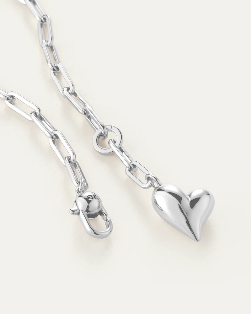Close-up of Jenny Bird Puffy Heart Necklace silver link chain — Lemonberry Aurora detail