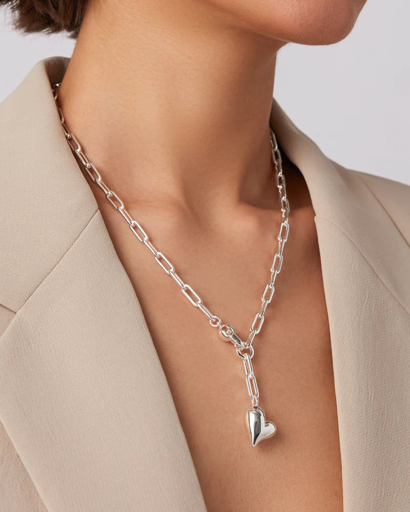 Jenny Bird Puffy Heart Necklace silver heart pendant styled on model — Lemonberry Aurora