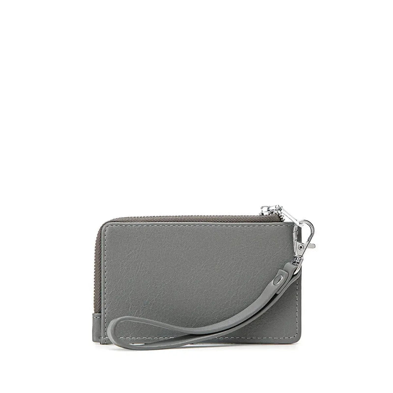 Back of grey Quinn Card Wallet with detachable wristlet strap