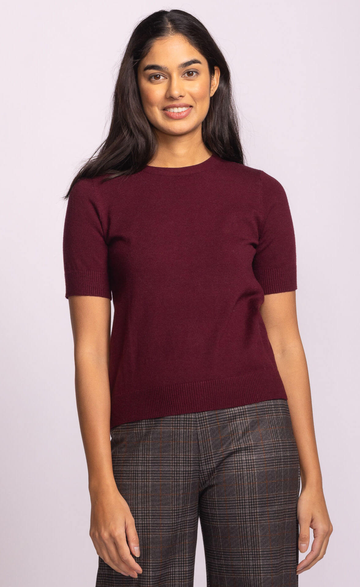 Front view of Pink Martini Remo Top in deep purple viscose knit, long sleeves, minimalist design – available at Lemonberry near Toronto