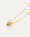 Folded metal detail on the Rio Pendant Necklace by Jenny Bird — high-polish gold finish available online at Lemonberry
