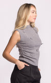 Side view of grey Rosslie sleeveless knit top with raised floral details and fitted silhouette.