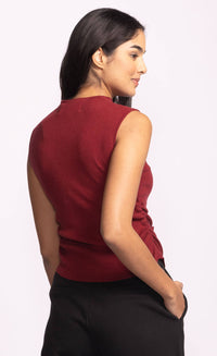 Back view of red Rosslie sleeveless knit sweater in soft mockneck style.