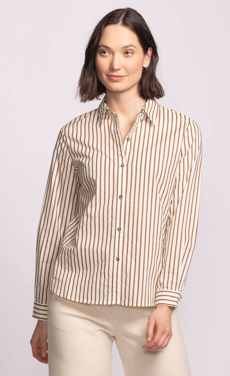 Pink Martini Sapphire Top in brown striped cotton, button-up shirt styled with cream pants – available at Lemonberry Aurora