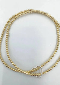 Saskia De Vries Jewelry Double Love Gold Leave-On available at Lemonberry Boutique Aurora