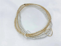 Saskia De Vries Jewelry Double Love Gold Leave-On available at Lemonberry Boutique Aurora