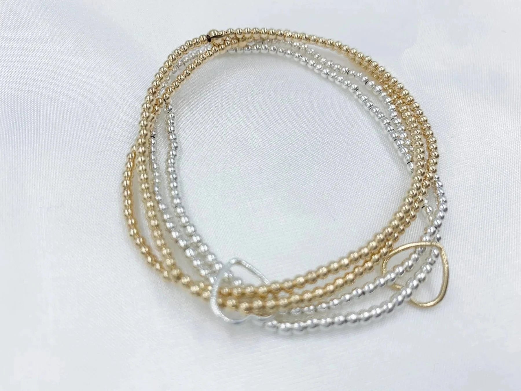 Saskia De Vries Jewelry Double Love Gold Leave-On available at Lemonberry Boutique Aurora