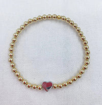 Saskia De Vries Jewelry Gold Love Heart available at Lemonberry Boutique Aurora