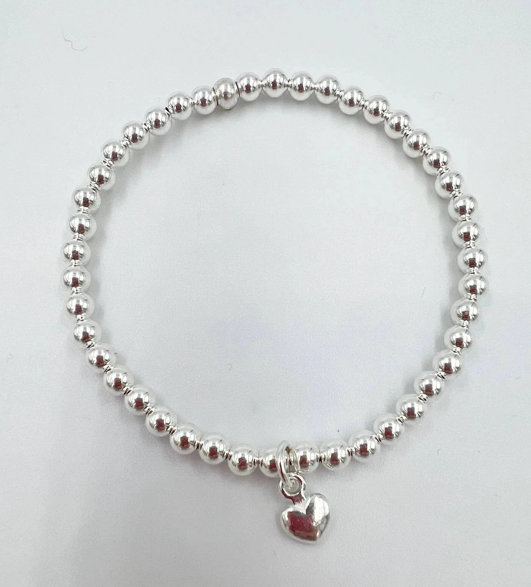 Saskia De Vries Jewelry Puffy Silver Heart available at Lemonberry Boutique Aurora