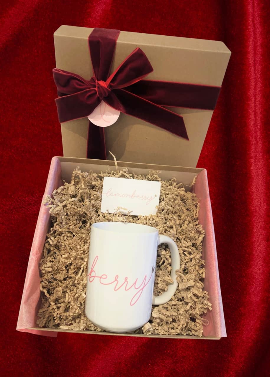 Front view of the Shop & Sip Gift Box with Lemonberry mug, optional gift card, and ribbon-wrapped packaging — Lemonberry Aurora.