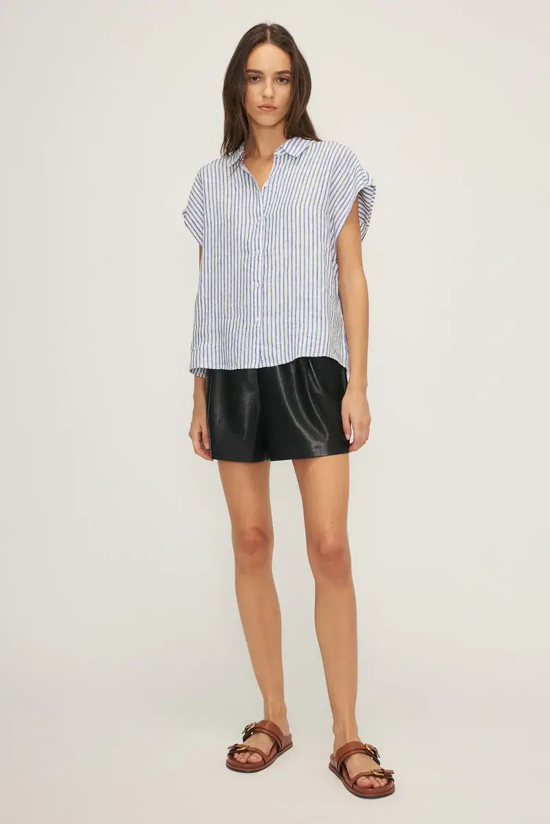 Simon short sleeve striped shirt by Melissa Nepton, front view on model with black shorts – available at Lemonberry in Aurora, Ontario