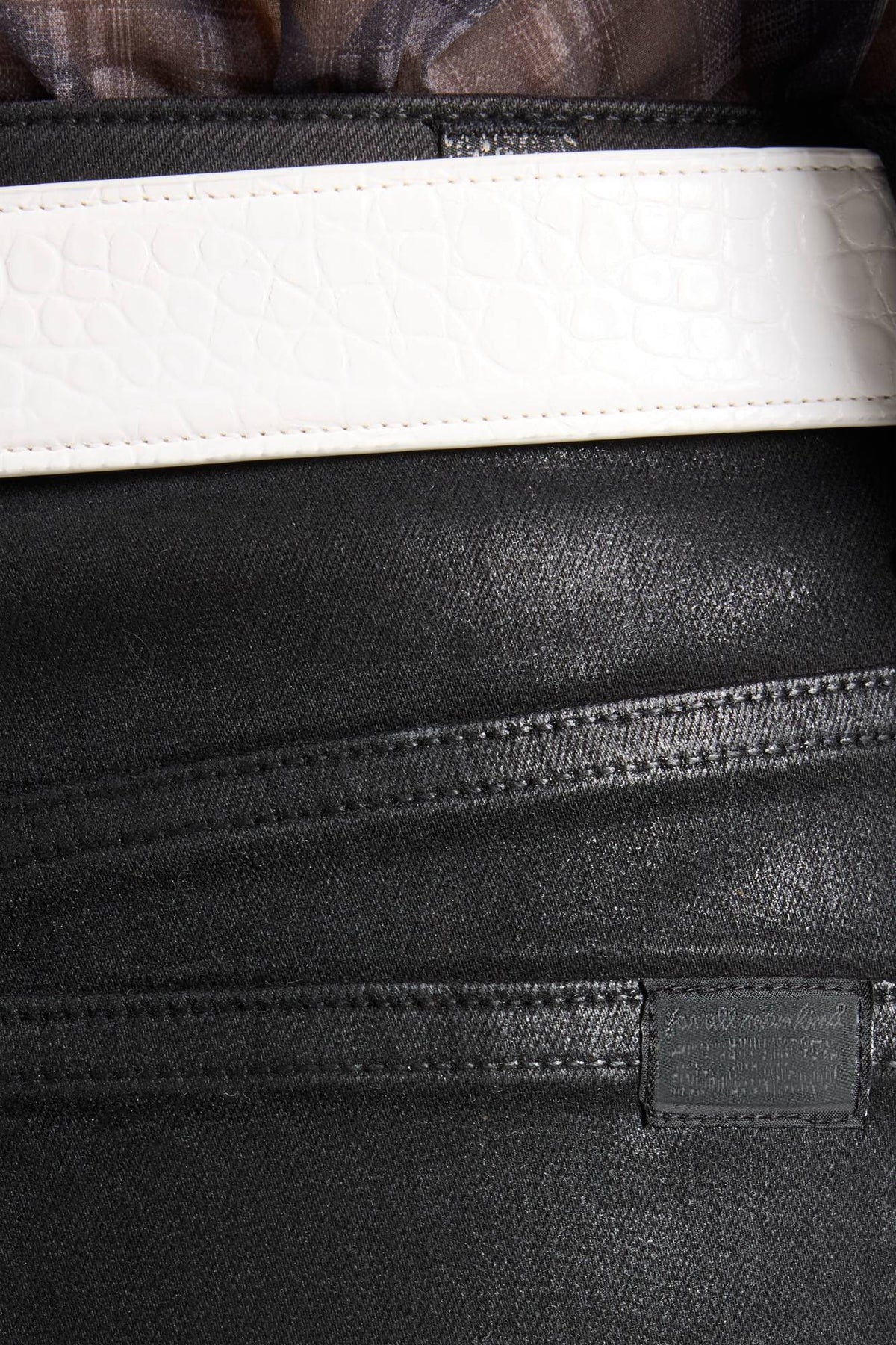 The Slim coated black jeans detail