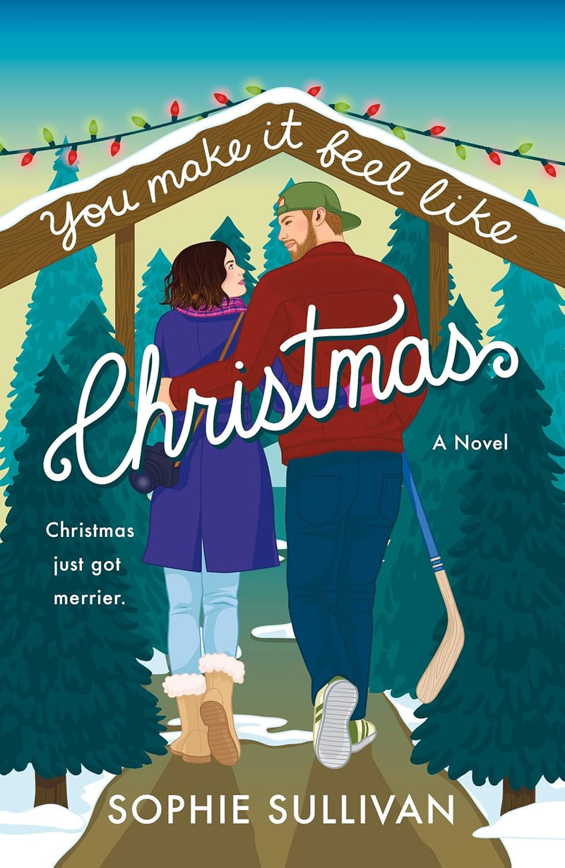 Book cover of You Make It Feel Like Christmas by Sophie Sullivan featuring a festive couple walking under Christmas lights, holiday romance novel