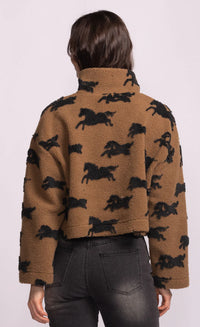 Back view of Spirit Jacket with all-over horse motif in black against camel fleece